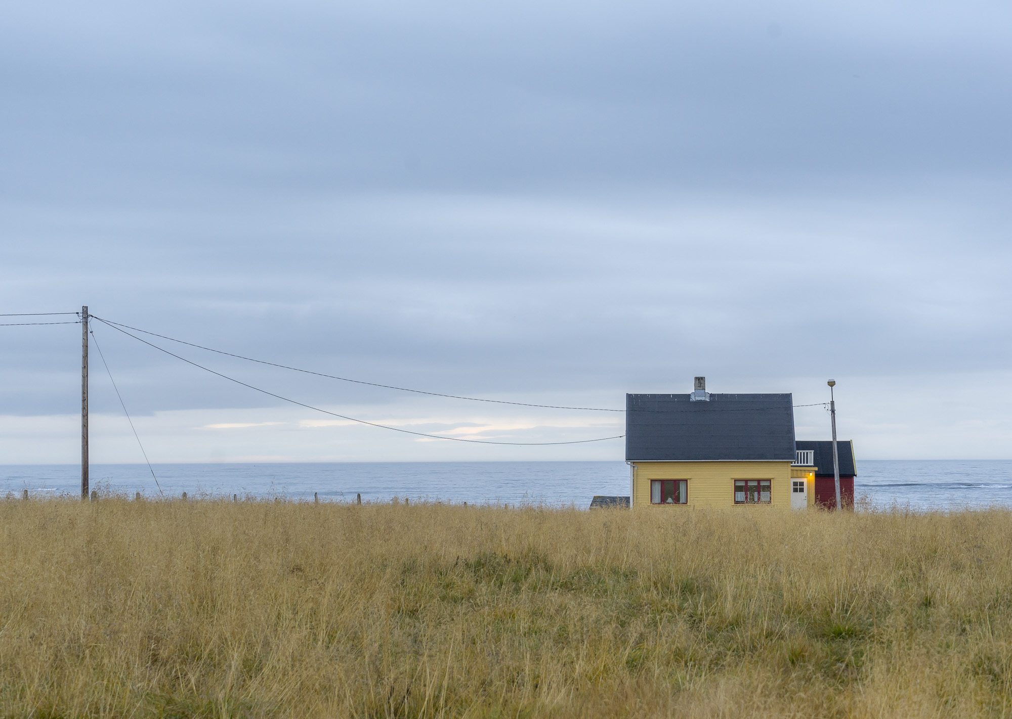 House and ocean cliche from Norway Finnmark Varangerhalvøya
