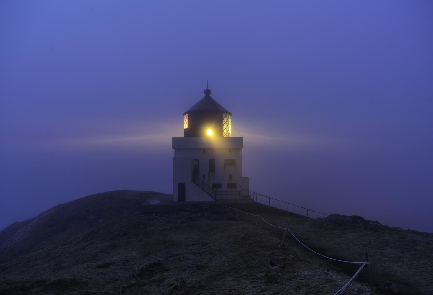 Runde lighthouse at evening fog from Norway Møre og Romsdal Herøy Runde Runde fyr